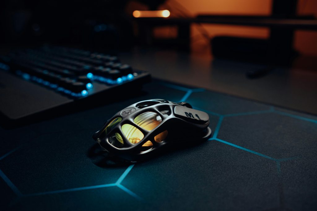 Futuristic Gaming Mouse on RGB Lit Desk